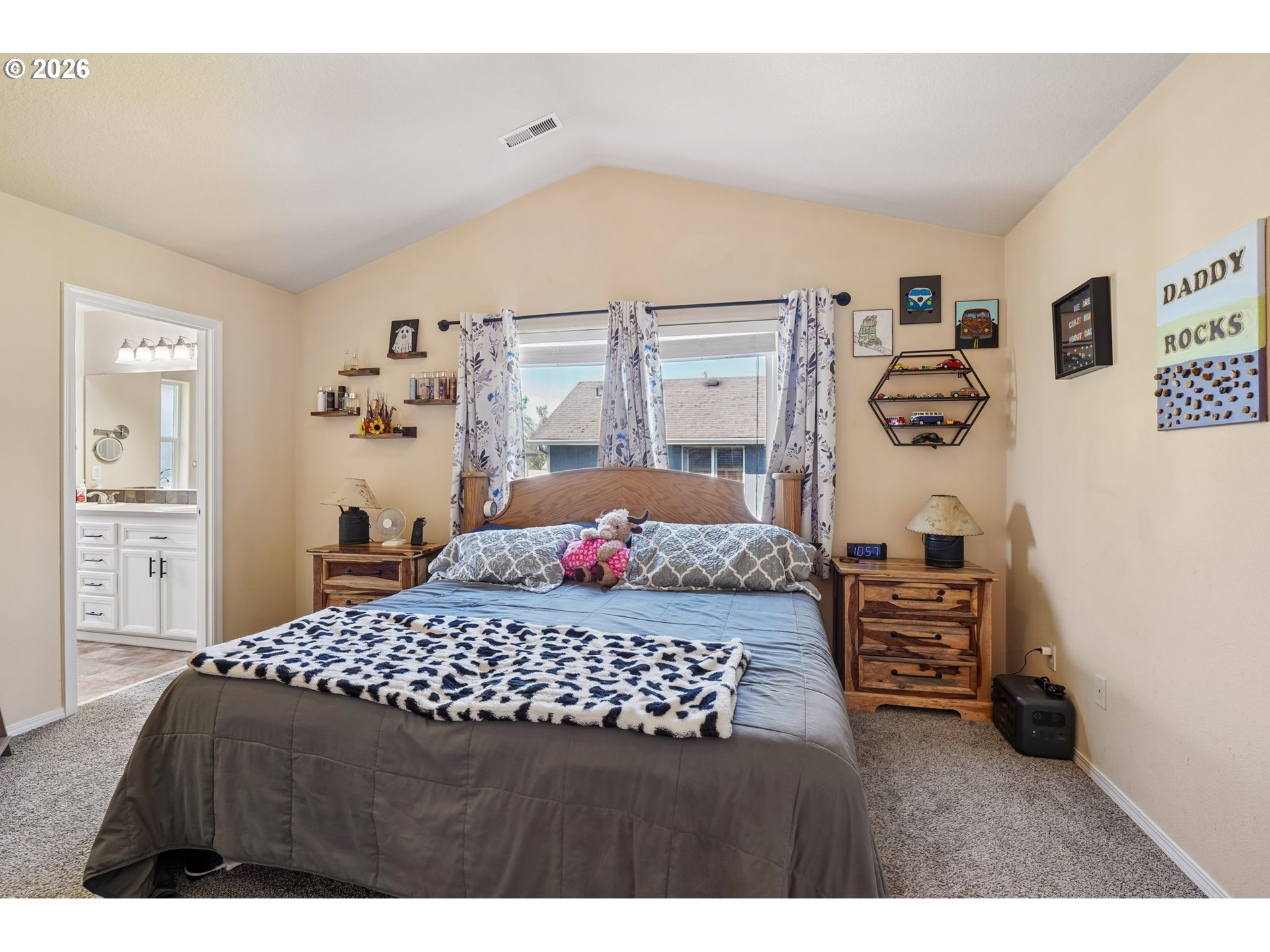 40348 Therese Street Sandy, OR 97055 - Photo 17 of 28 a bedroom with a bed and dresser