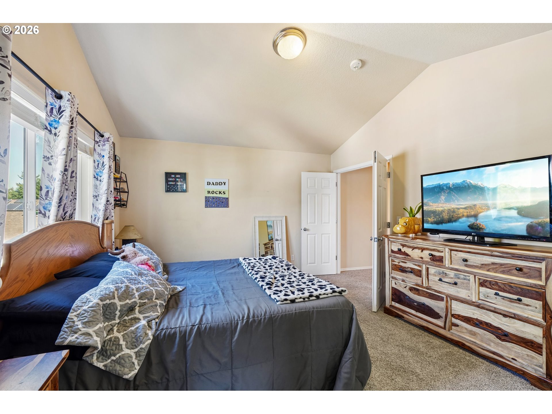 40348 Therese Street Sandy, OR 97055 - Photo 18 of 28 a bedroom with a bed and a television