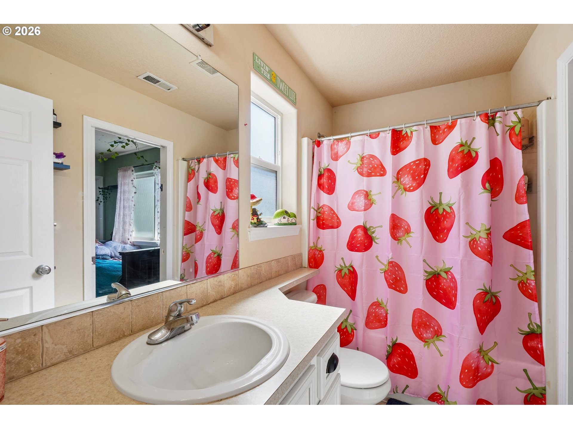 40348 Therese Street Sandy, OR 97055 - Photo 22 of 28 a bathroom with a sink and a mirror