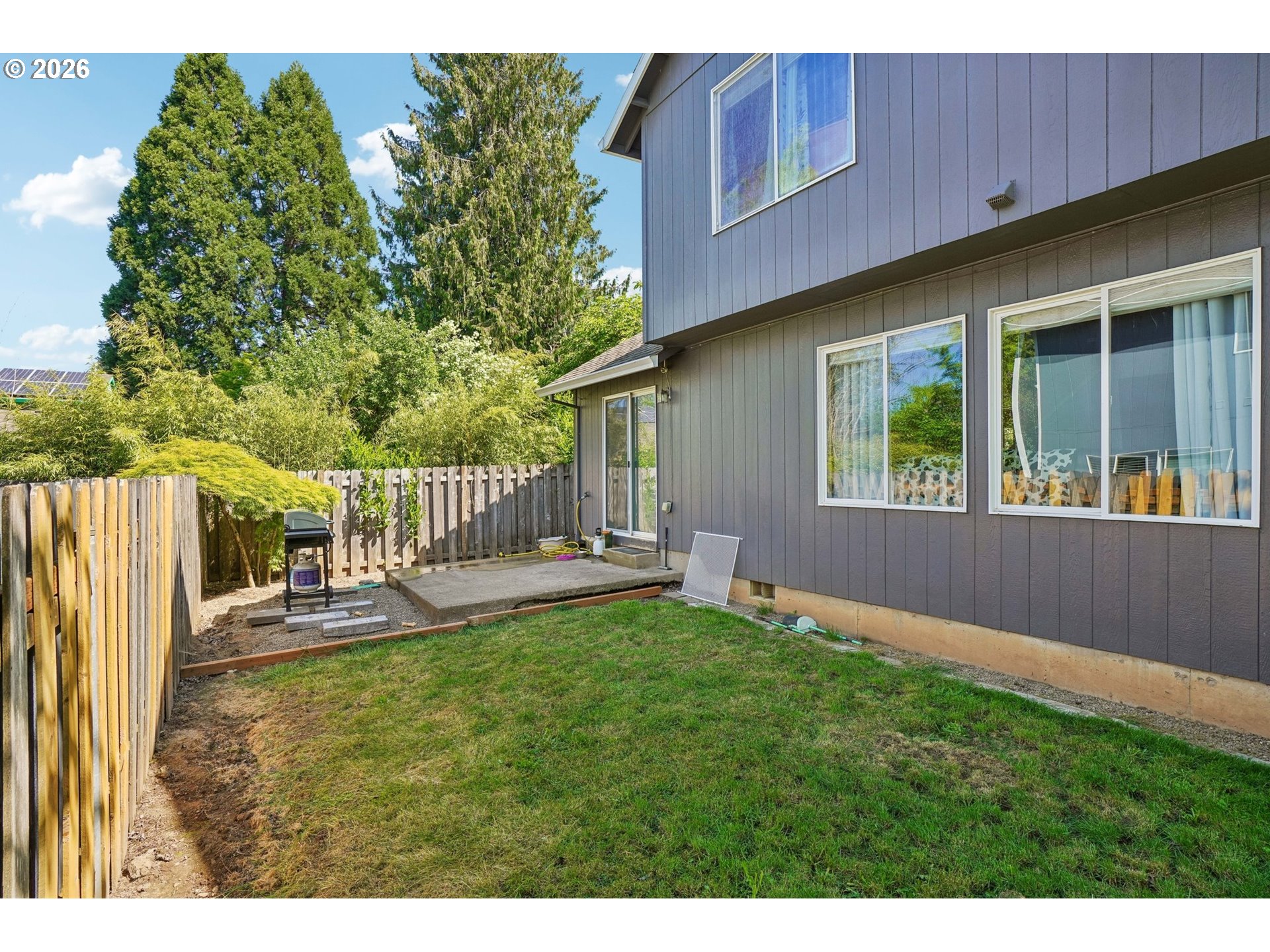 40348 Therese Street Sandy, OR 97055 - Photo 26 of 28 a view of house with backyard and outdoor seating