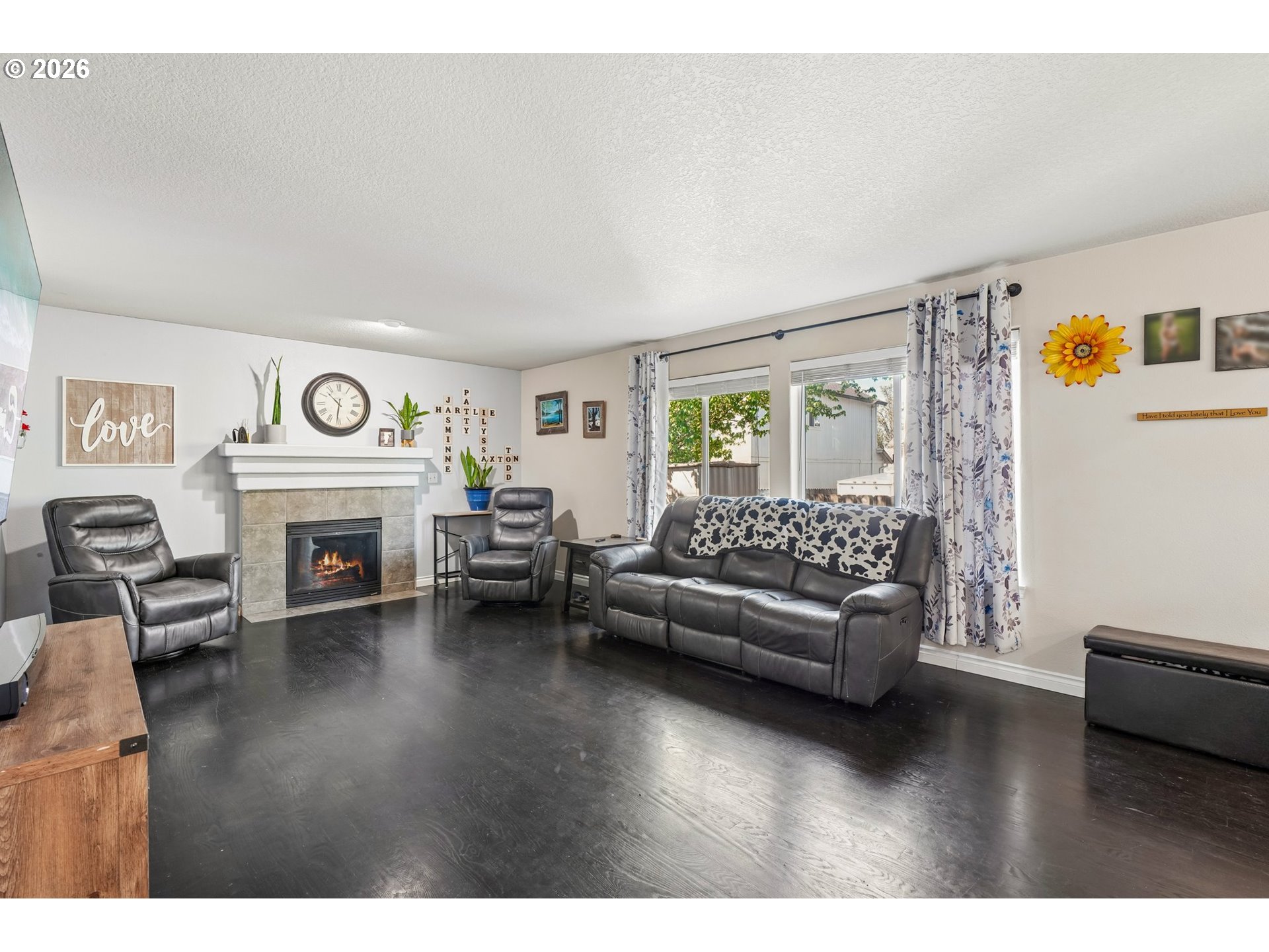 40348 Therese Street Sandy, OR 97055 - Photo 4 of 28 a living room with furniture and a fireplace