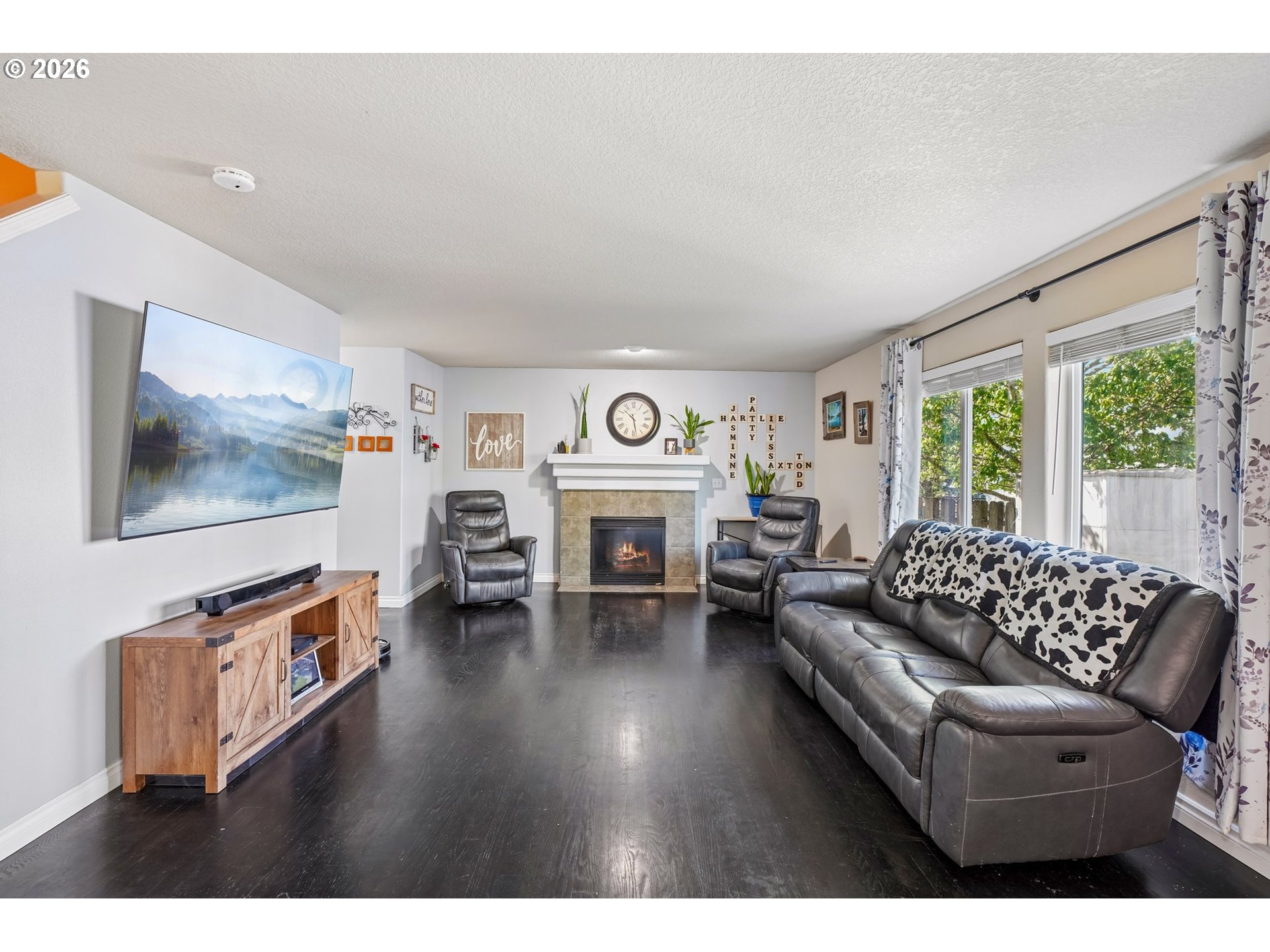 40348 Therese Street Sandy, OR 97055 - Photo 5 of 28 a living room with furniture and a fireplace