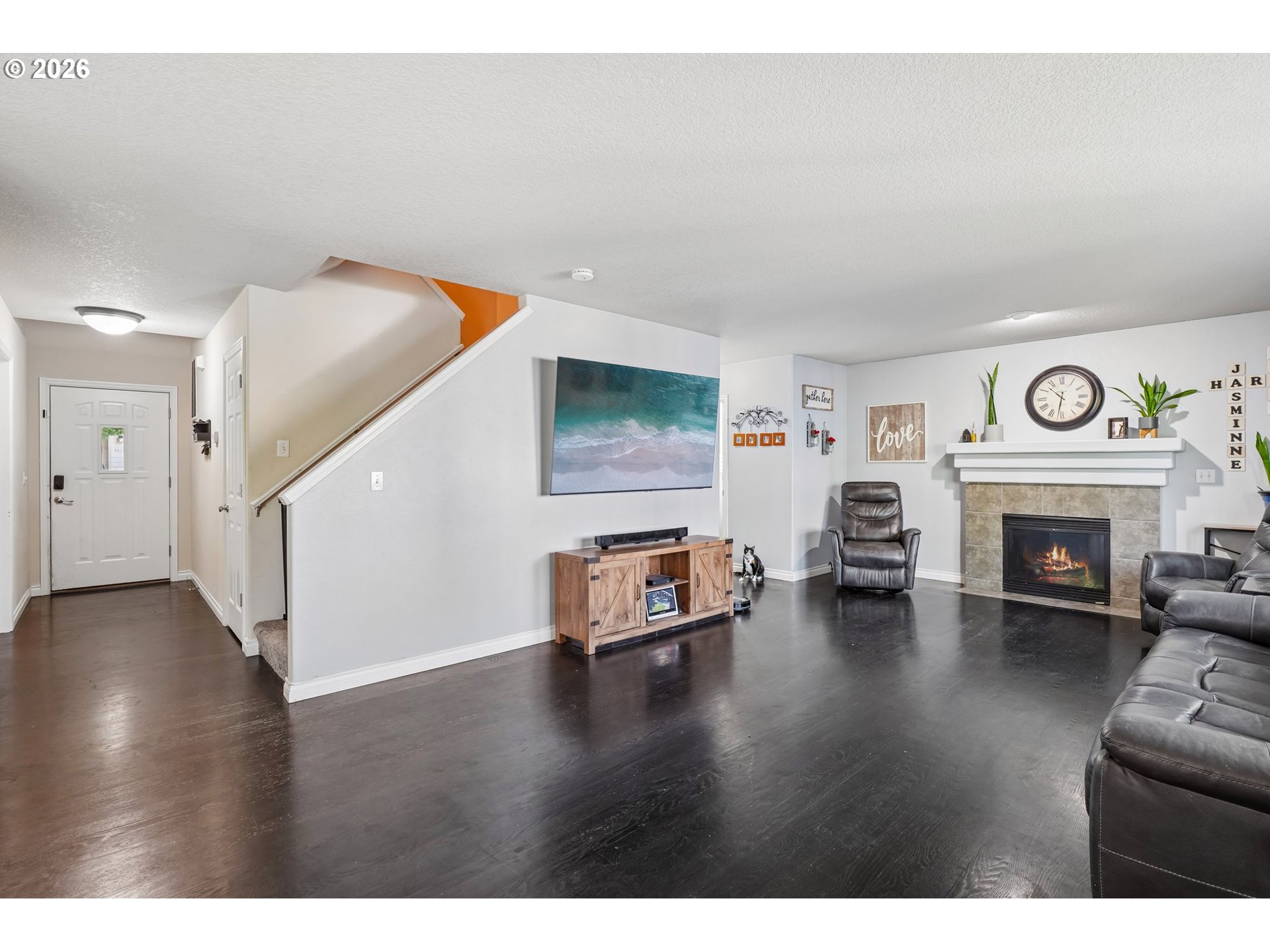 40348 Therese Street Sandy, OR 97055 - Photo 6 of 28 a living room with furniture and a fireplace