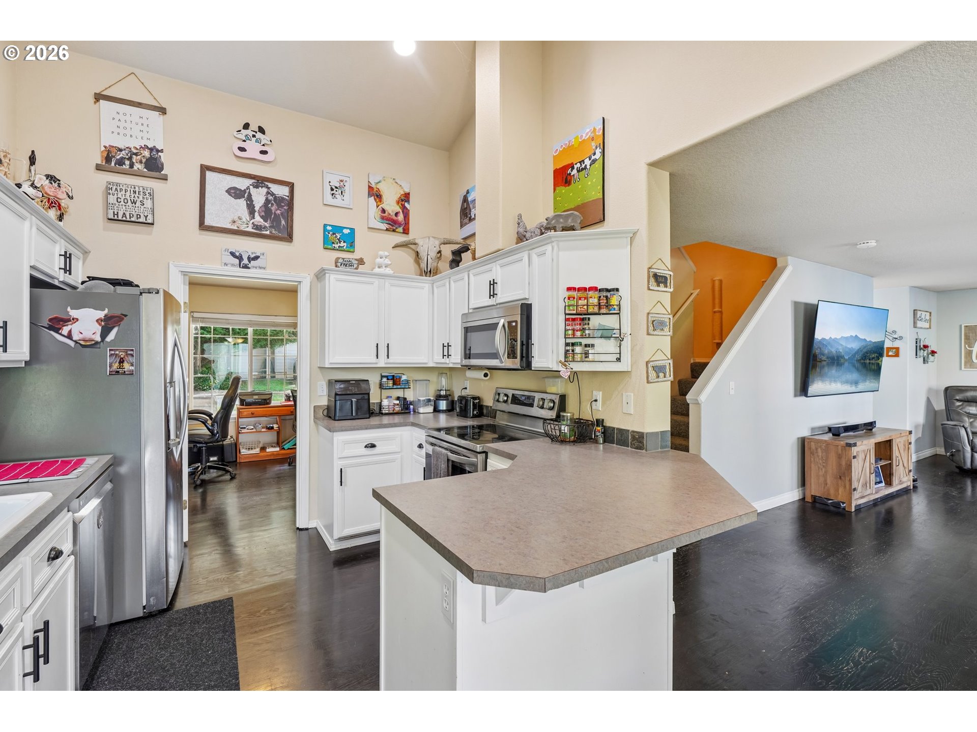 40348 Therese Street Sandy, OR 97055 - Photo 9 of 28 a kitchen view with cabinets a stove and a couch