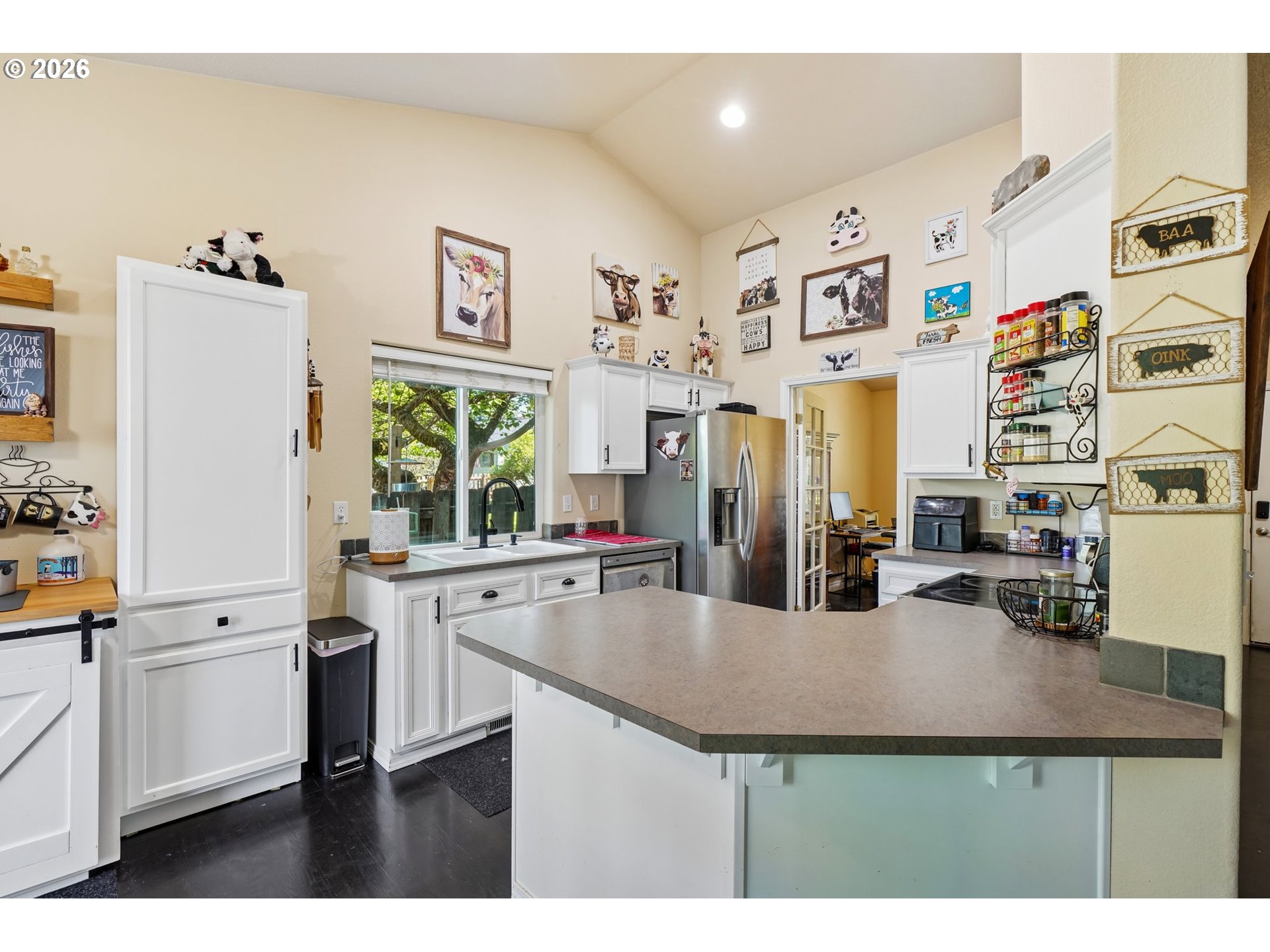 40348 Therese Street Sandy, OR 97055 - Photo 10 of 28 a kitchen with stainless steel appliances a sink and a refrigerator