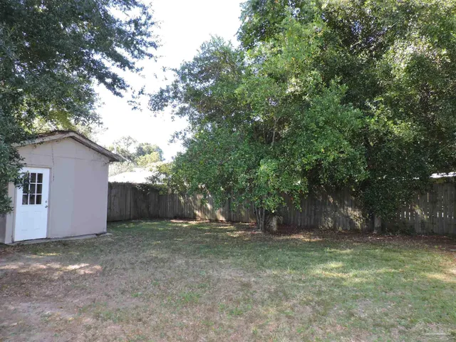 a view of outdoor space and yard