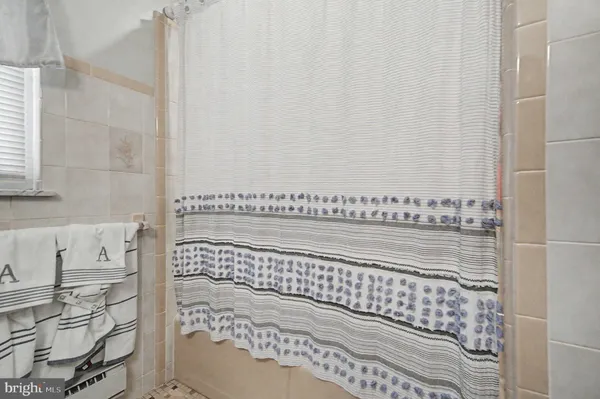 a view of a bathtub in bathroom