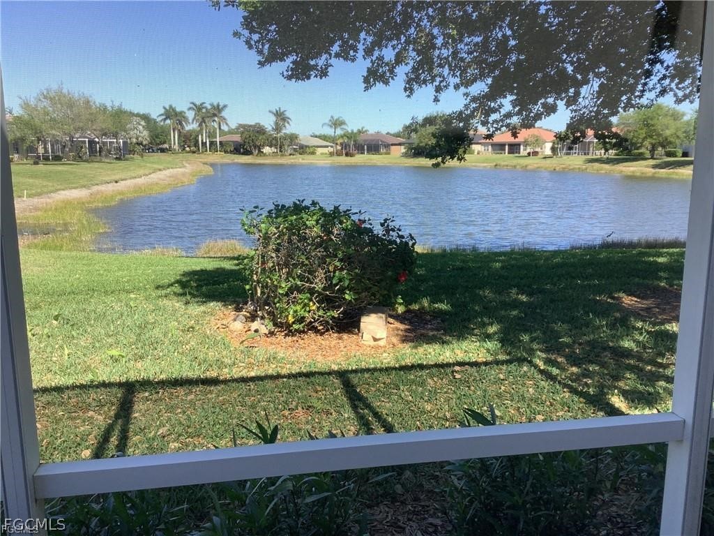 4791 Fairloop Run Lehigh Acres, FL 33973 - Photo 19 of 19 a view of lake from a balcony