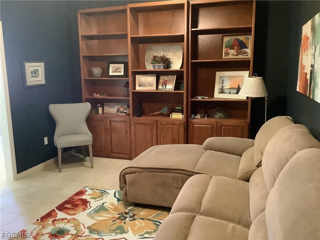 4791 Fairloop Run Lehigh Acres, FL 33973 - Photo 9 of 19 a living room with furniture