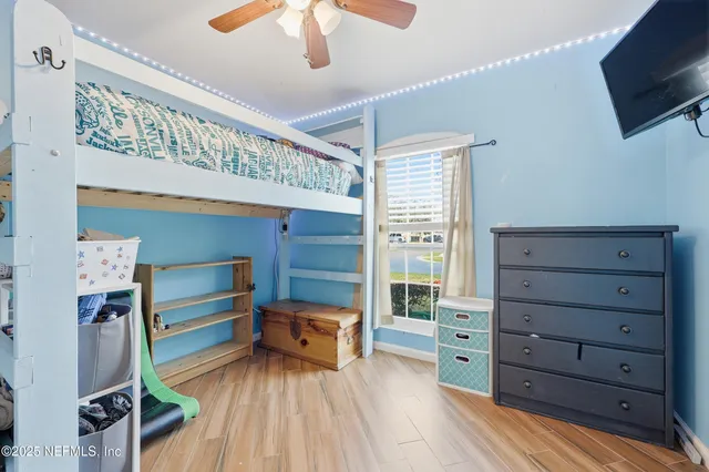 a view of entryway with stairs and wooden floor