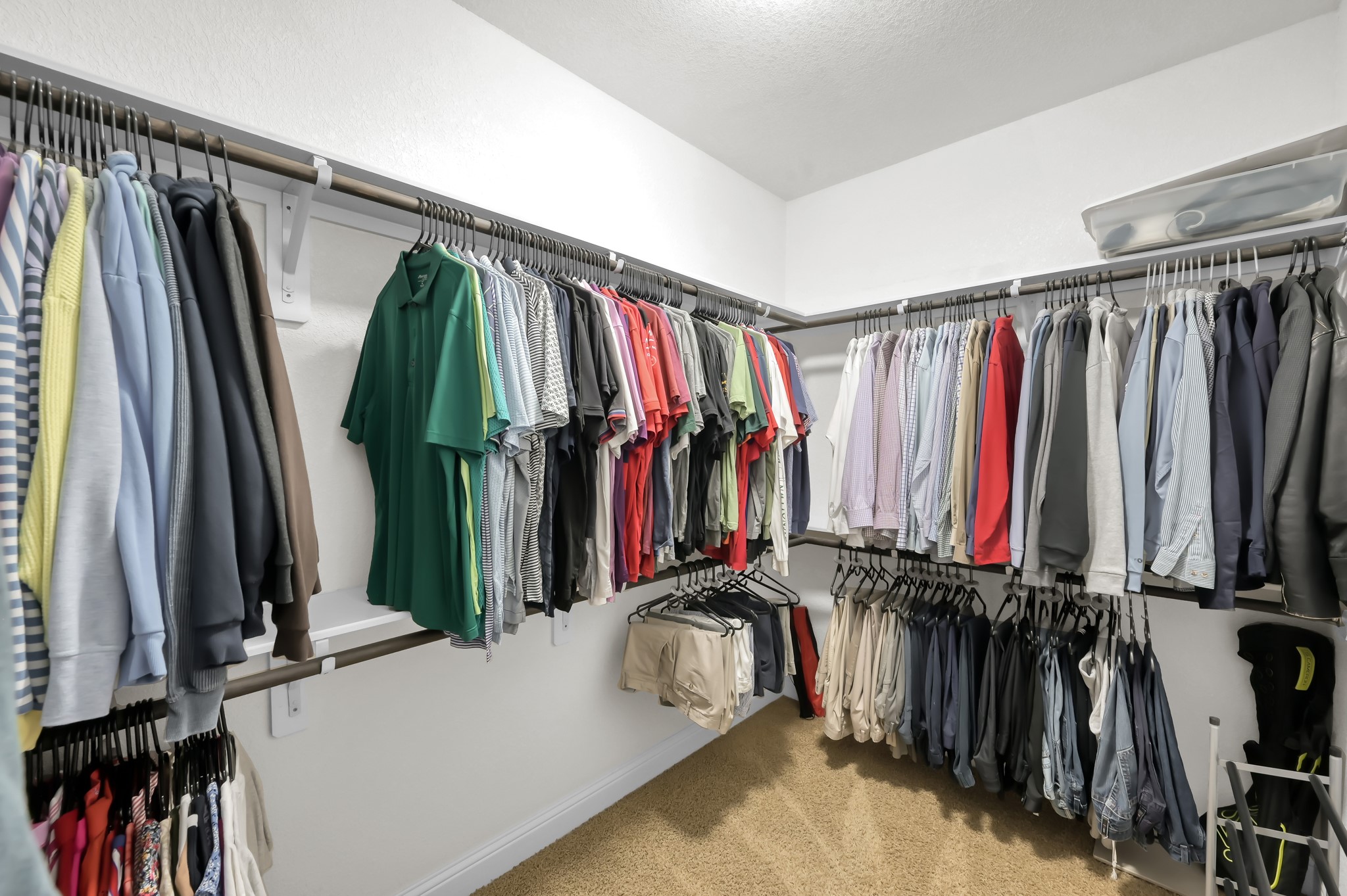 23 Rancher's Trail Tomball, TX 77375 - Photo 23 of 40 This spacious, organized closet is a dream come true for any home buyer, offering ample storage and a sleek, modern design.
