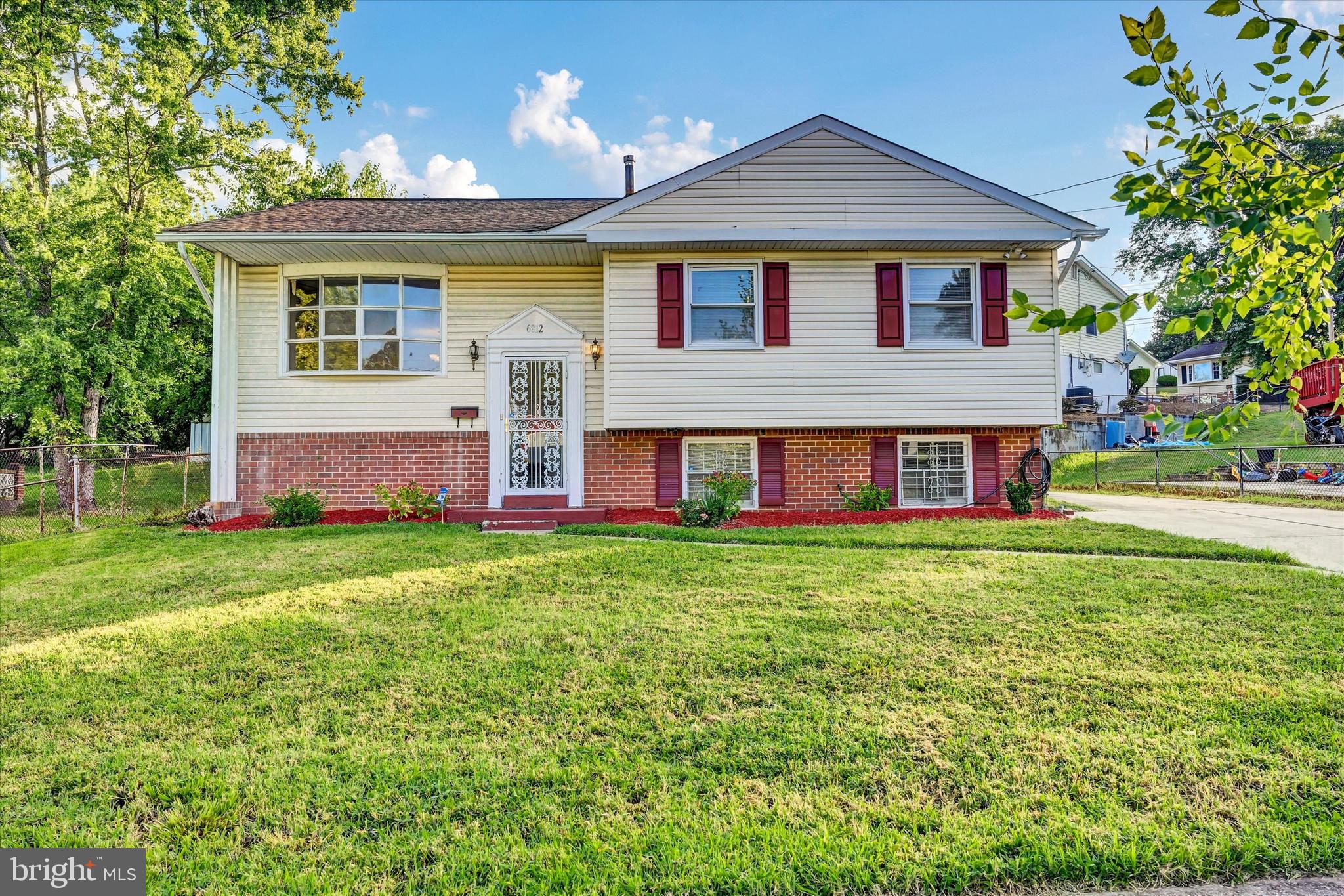 6812 Pepper Street Capitol Heights, MD 20743 - Photo 1 of 42 a front view of house with yard and seating area