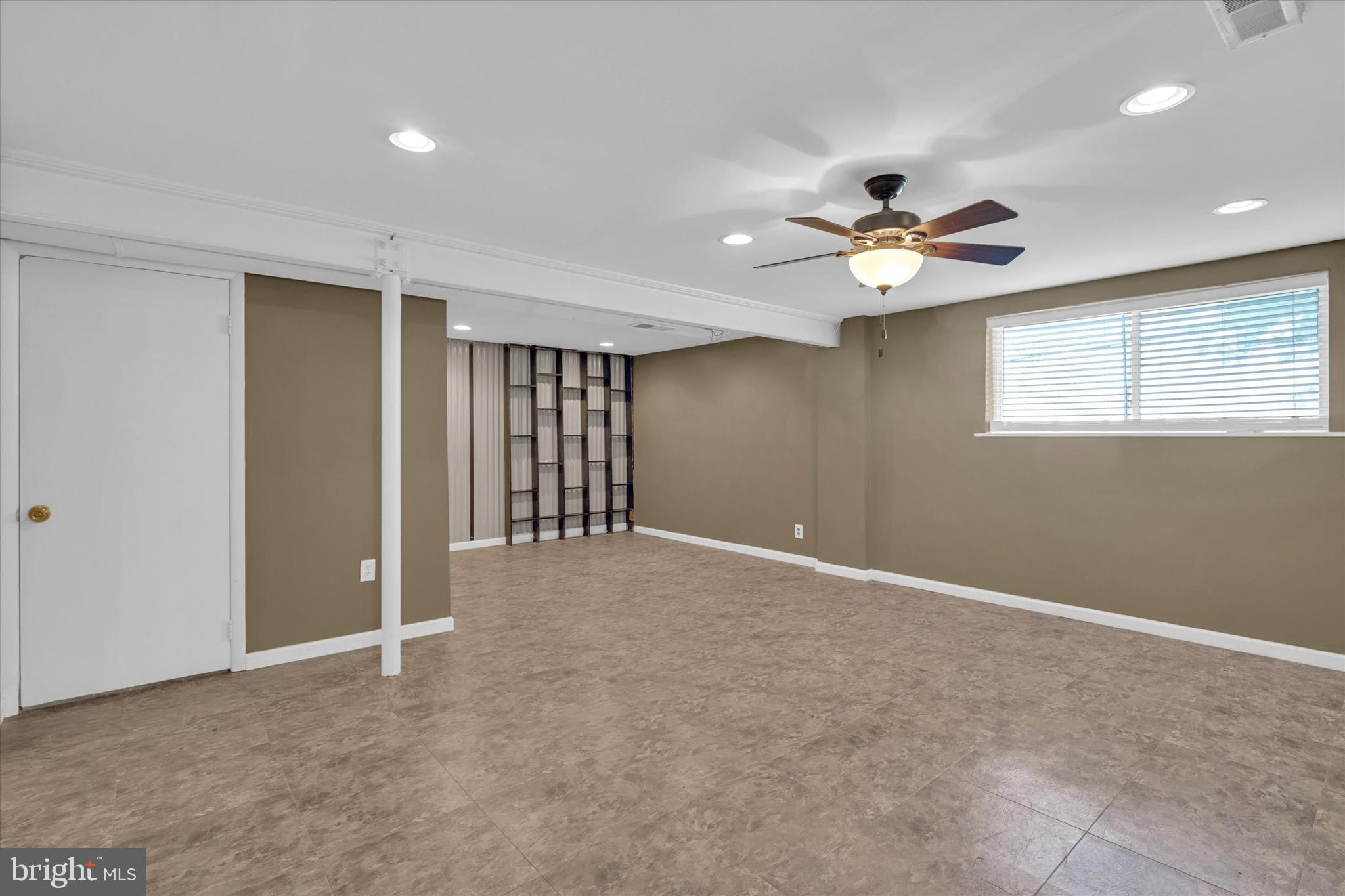 6812 Pepper Street Capitol Heights, MD 20743 - Photo 28 of 42 a view of an empty room with a window