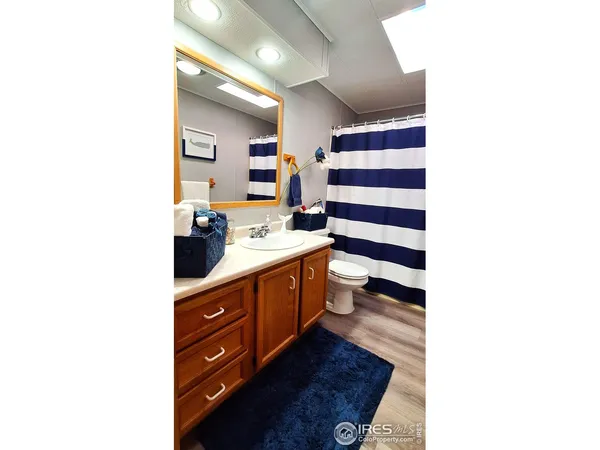a kitchen with a sink and a stove top oven
