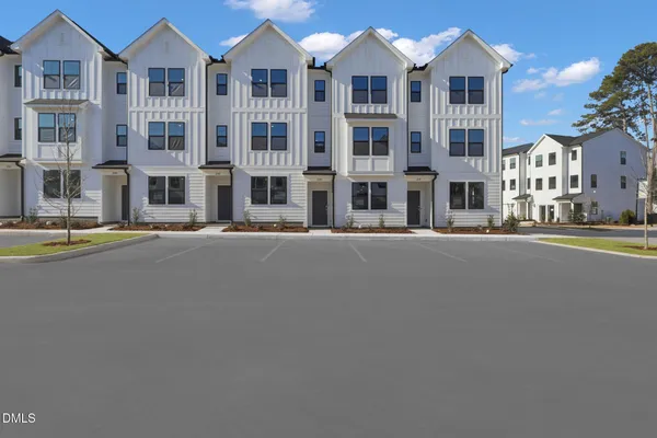 a front view of a building with street view