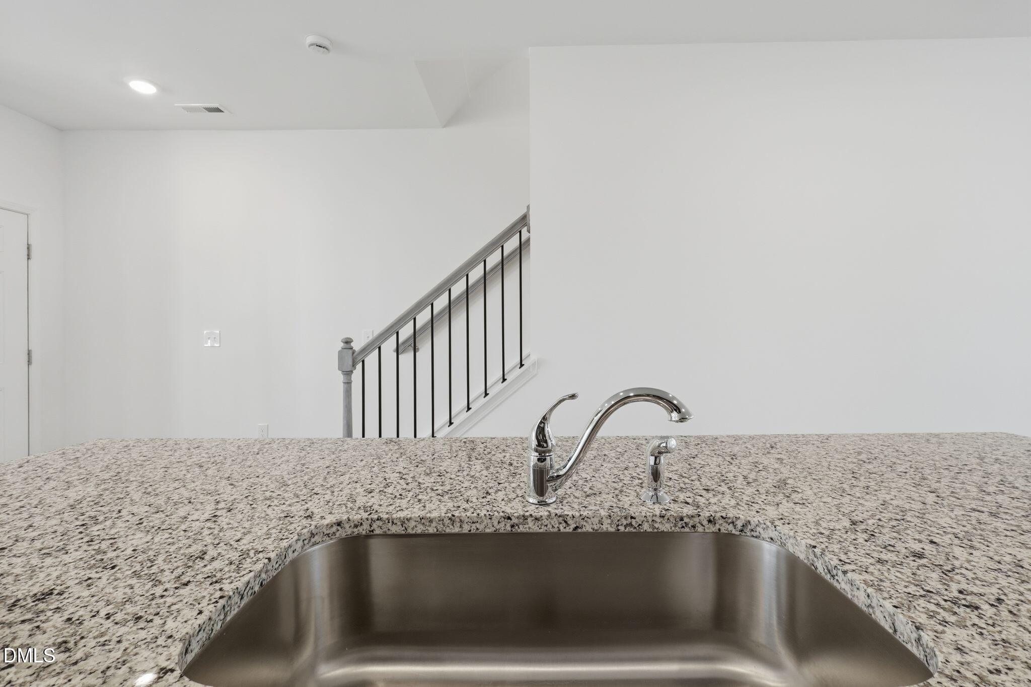 2309 Oakwood Mdws Court Raleigh, NC 27604 - Photo 11 of 34 a close view of sink and tap