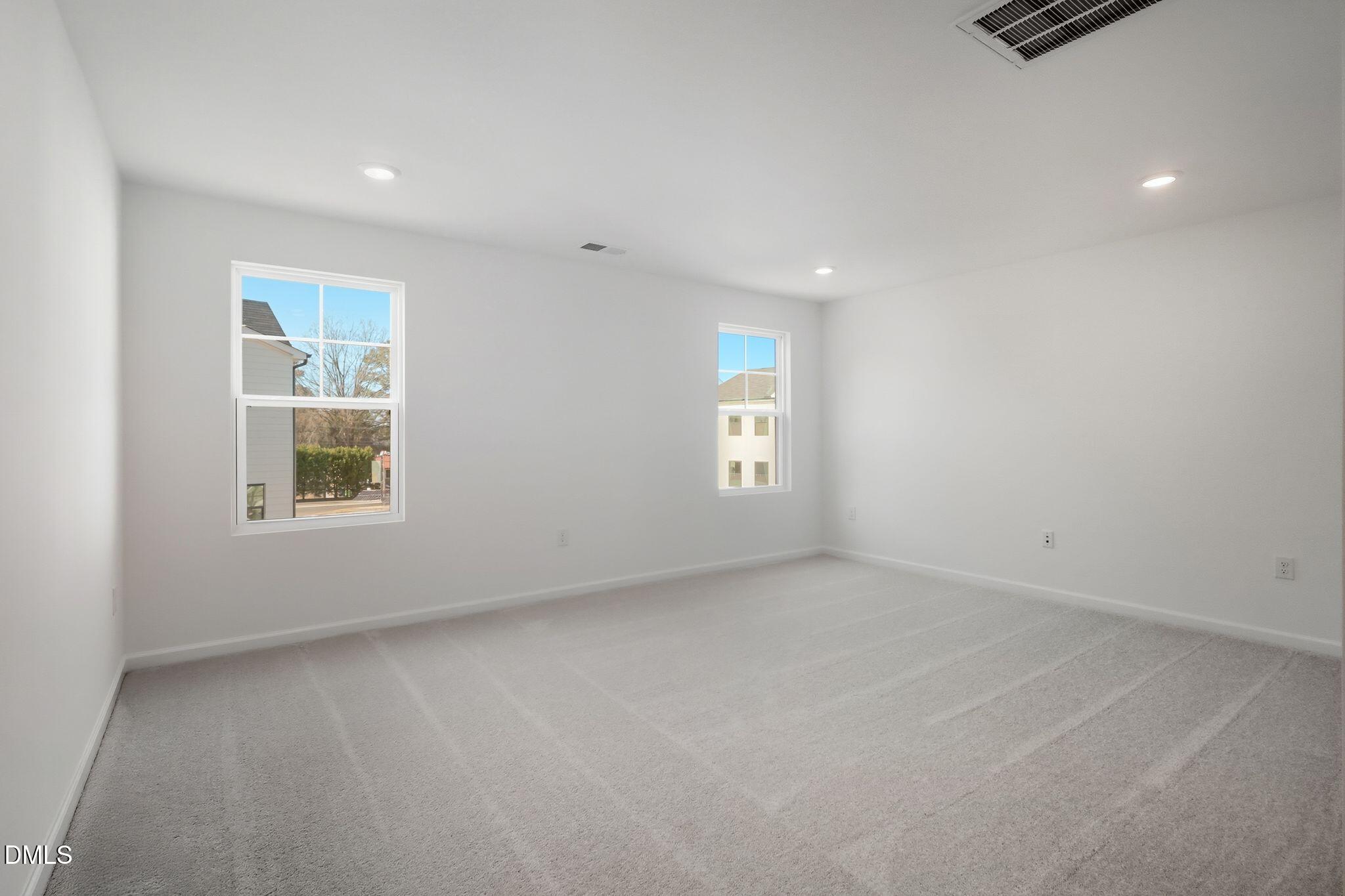 2309 Oakwood Mdws Court Raleigh, NC 27604 - Photo 30 of 34 an empty room with windows