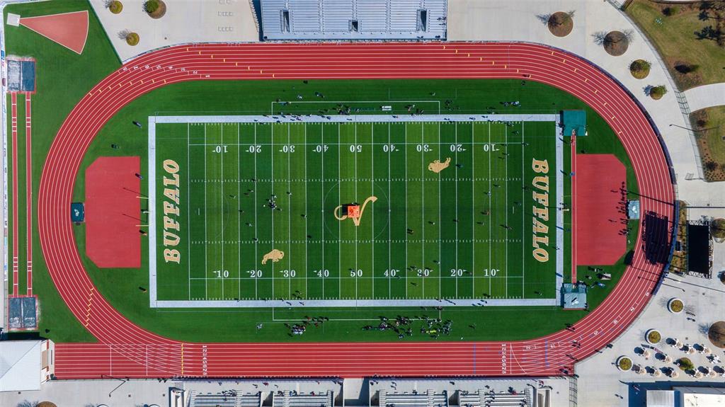 178 Highway 301 Sumterville, FL 33585 - Photo 14 of 25 a view of a tennis ground with a swimming pool