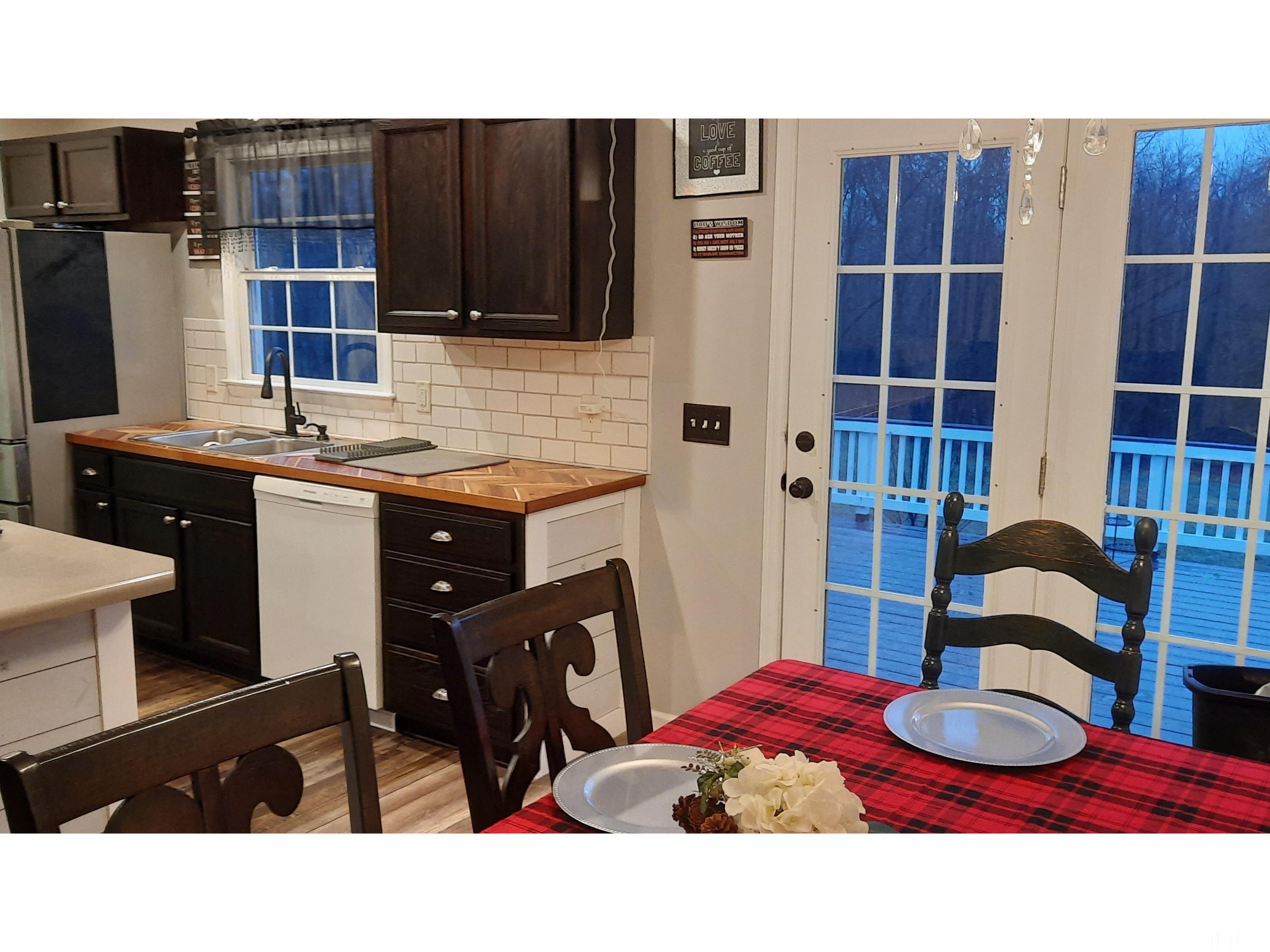 134 Collin Drive Roxboro, NC 27574 - Photo 16 of 31 a bathroom with a sink a toilet and shower