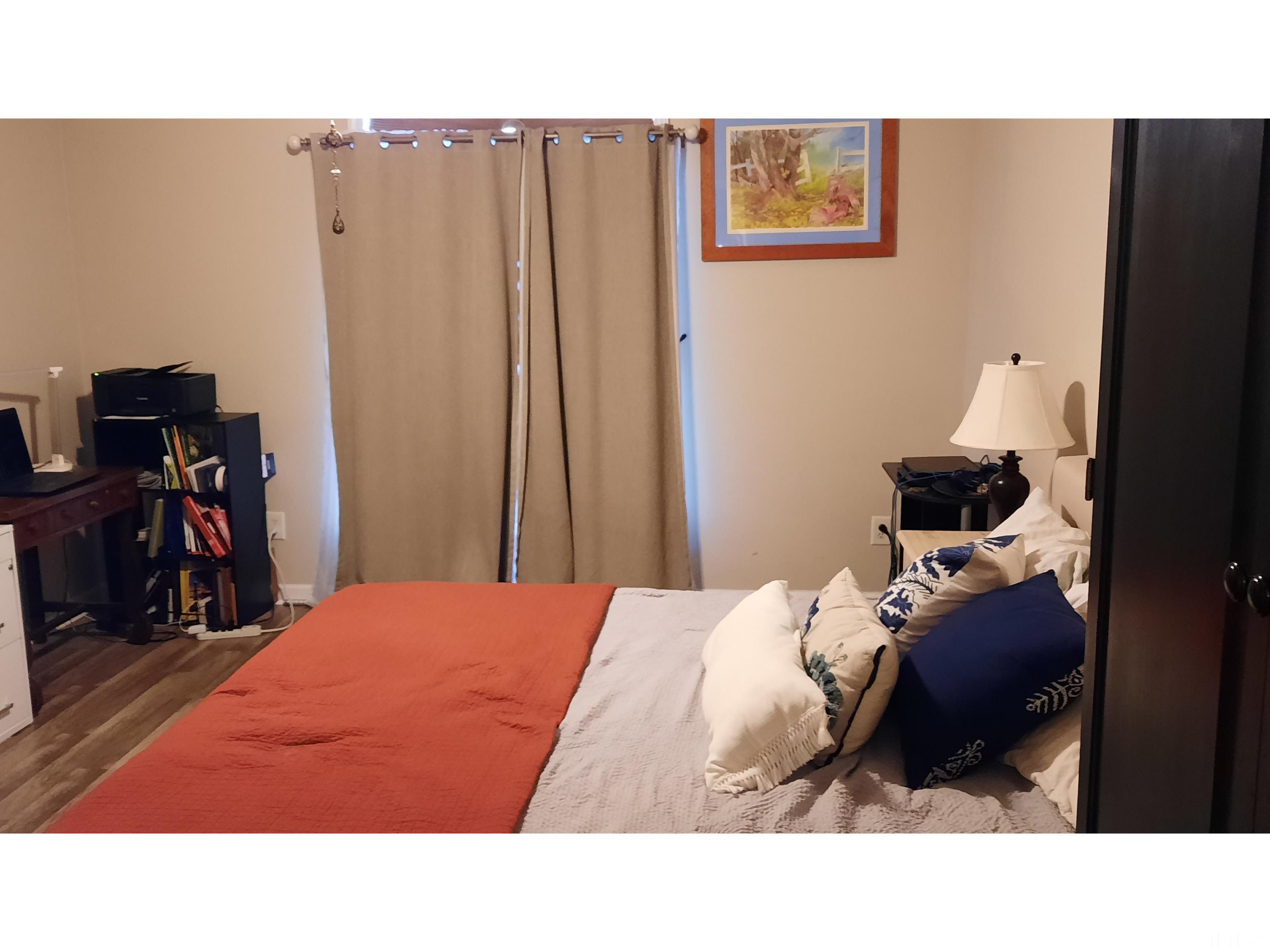 134 Collin Drive Roxboro, NC 27574 - Photo 20 of 31 a room with a bed and a view of bathroom