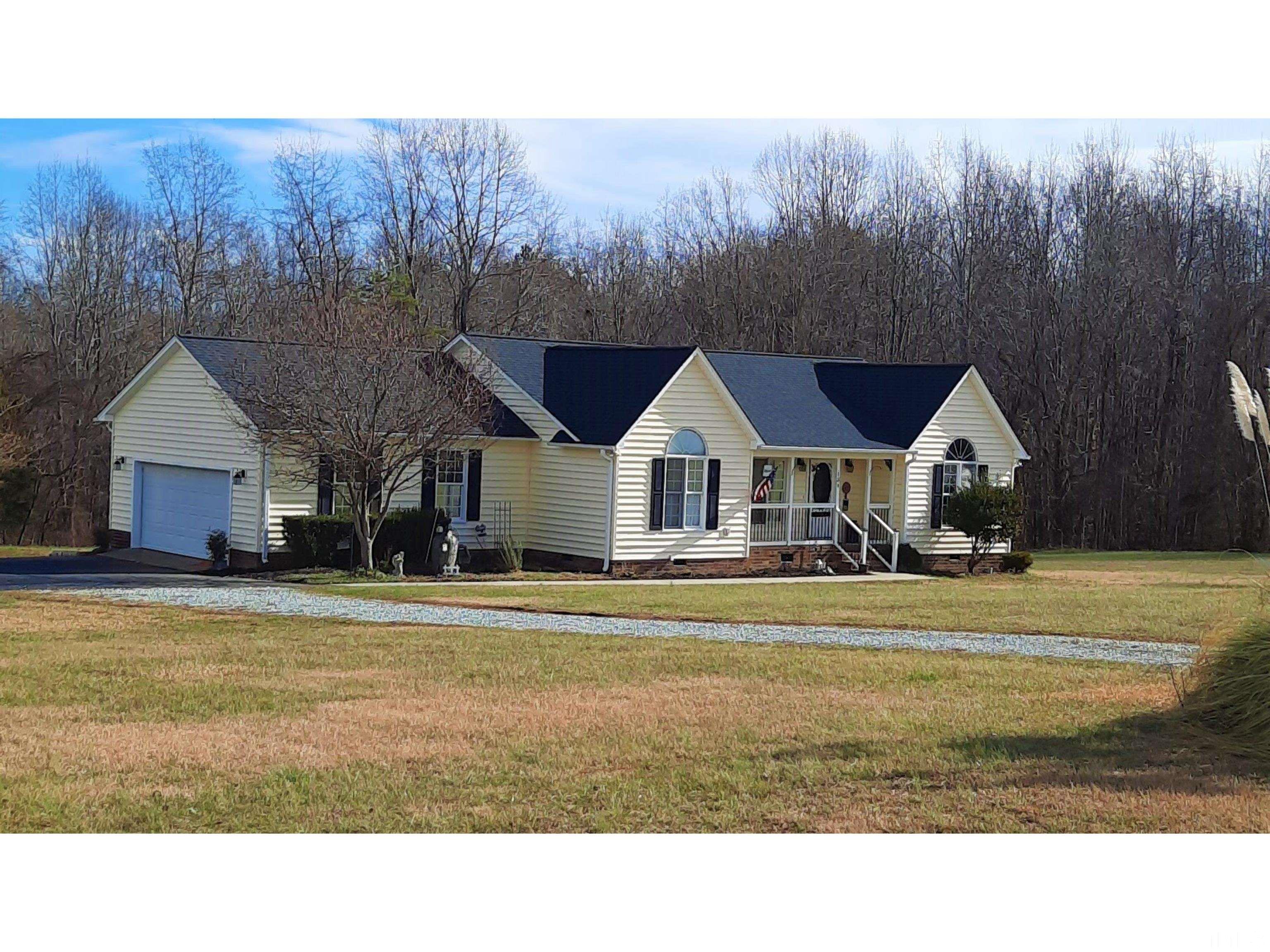 134 Collin Drive Roxboro, NC 27574 - Photo 3 of 31 a view of house and outdoor space with swimming pool