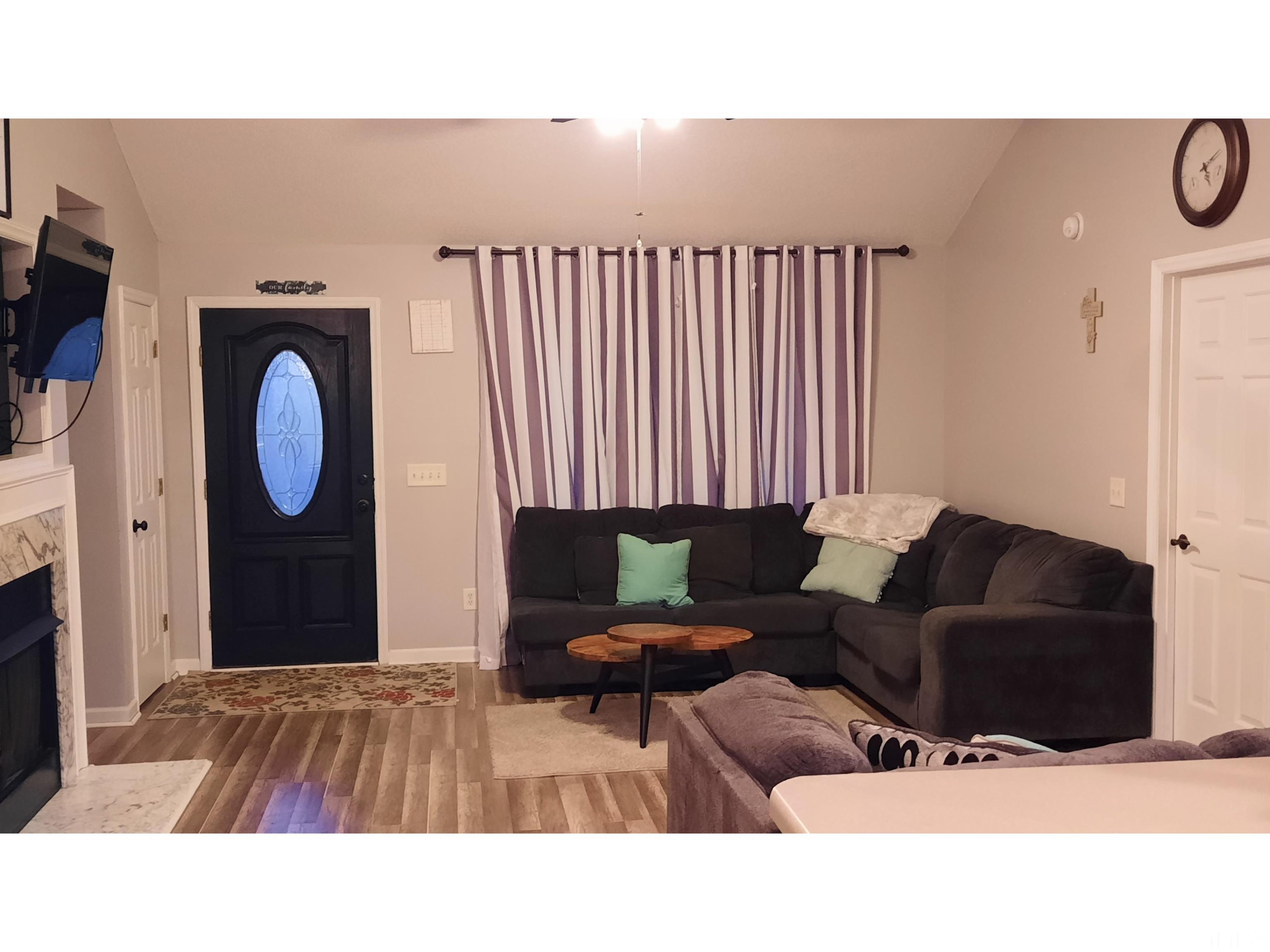 134 Collin Drive Roxboro, NC 27574 - Photo 10 of 31 a living room with furniture and a window
