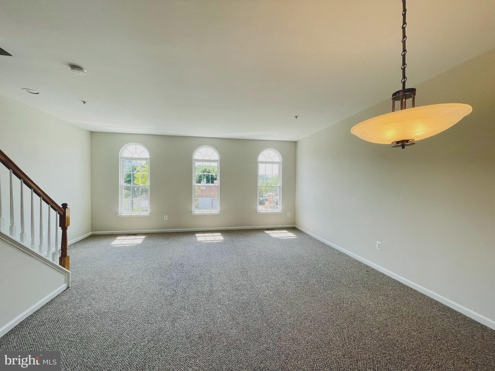 709 Gaither Road Rockville, MD 20850 - Photo 11 of 51 Wall of windows in living room