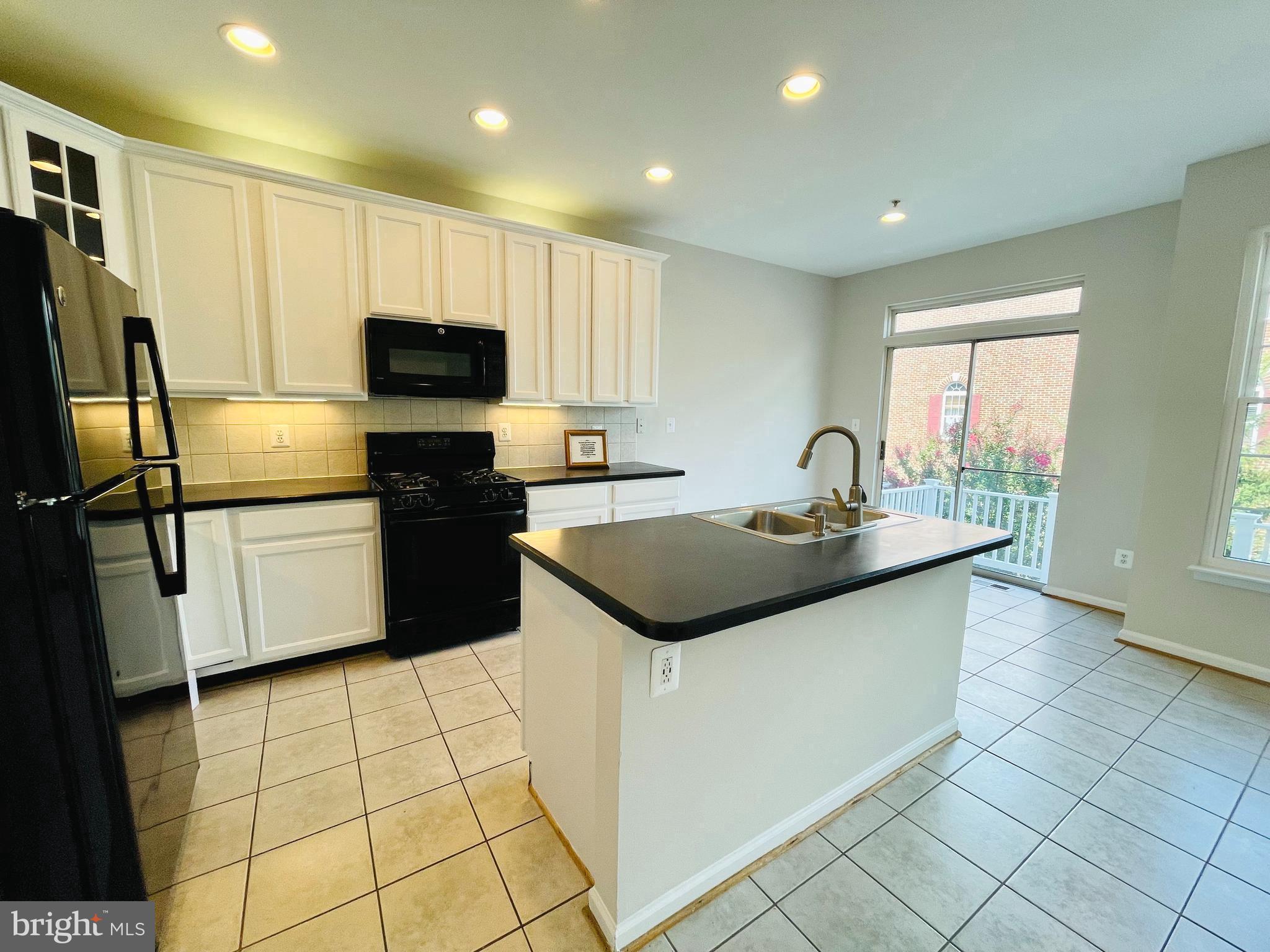709 Gaither Road Rockville, MD 20850 - Photo 12 of 51 Spacious kitchen with island