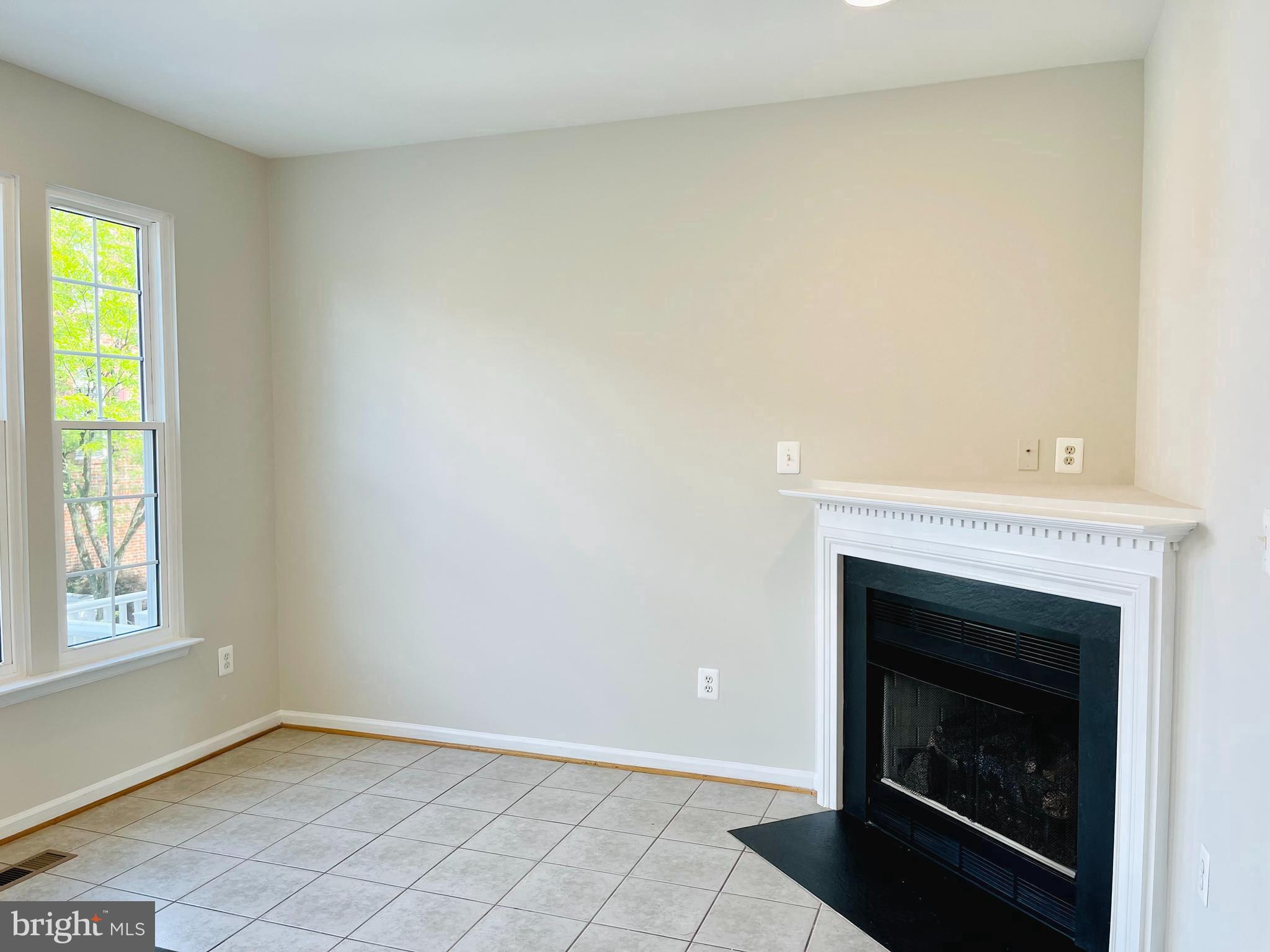 709 Gaither Road Rockville, MD 20850 - Photo 15 of 51 Versatile sitting area off kitchen w/gas FP