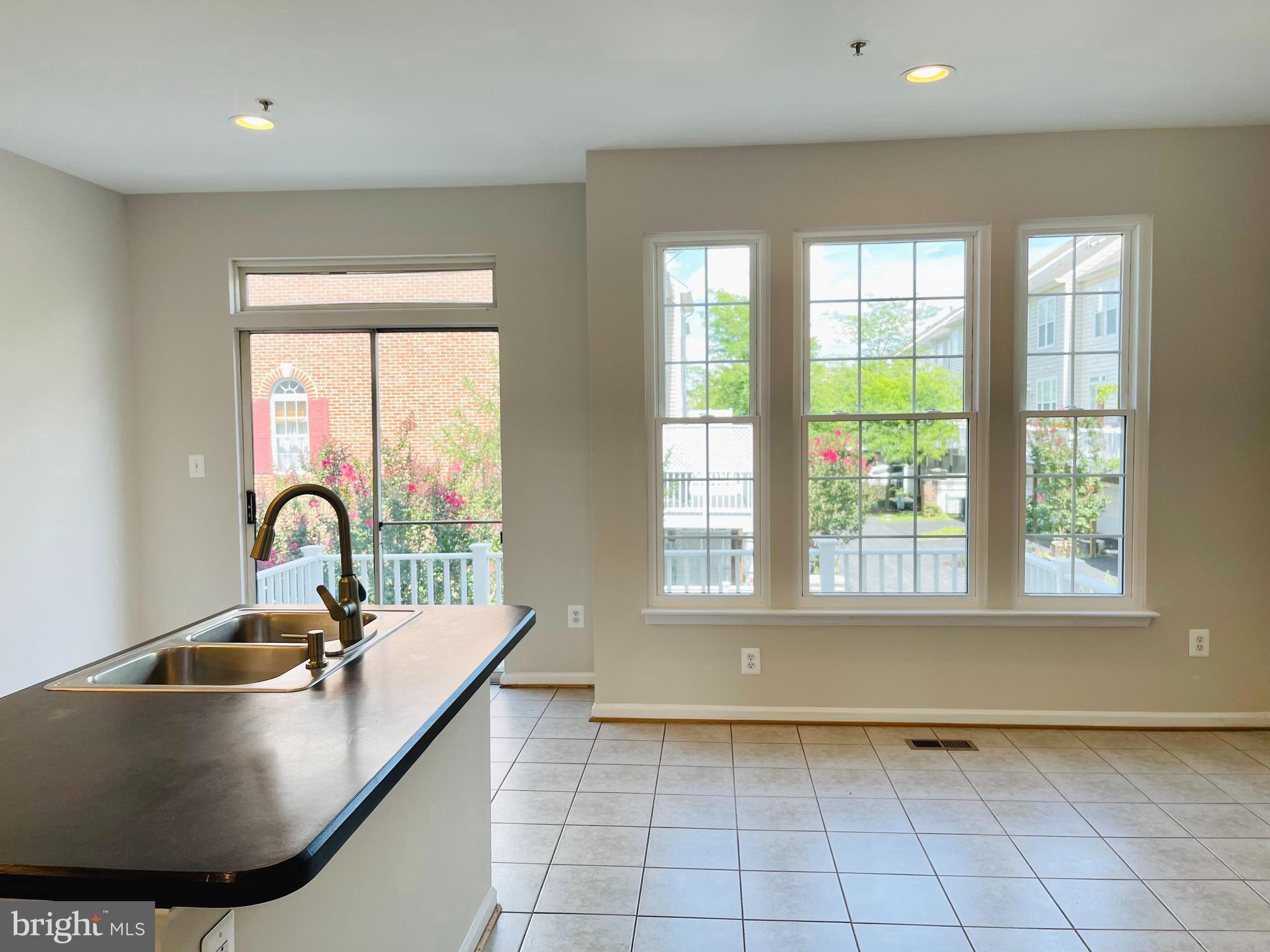 709 Gaither Road Rockville, MD 20850 - Photo 17 of 51 Convenient deck access off kitchen