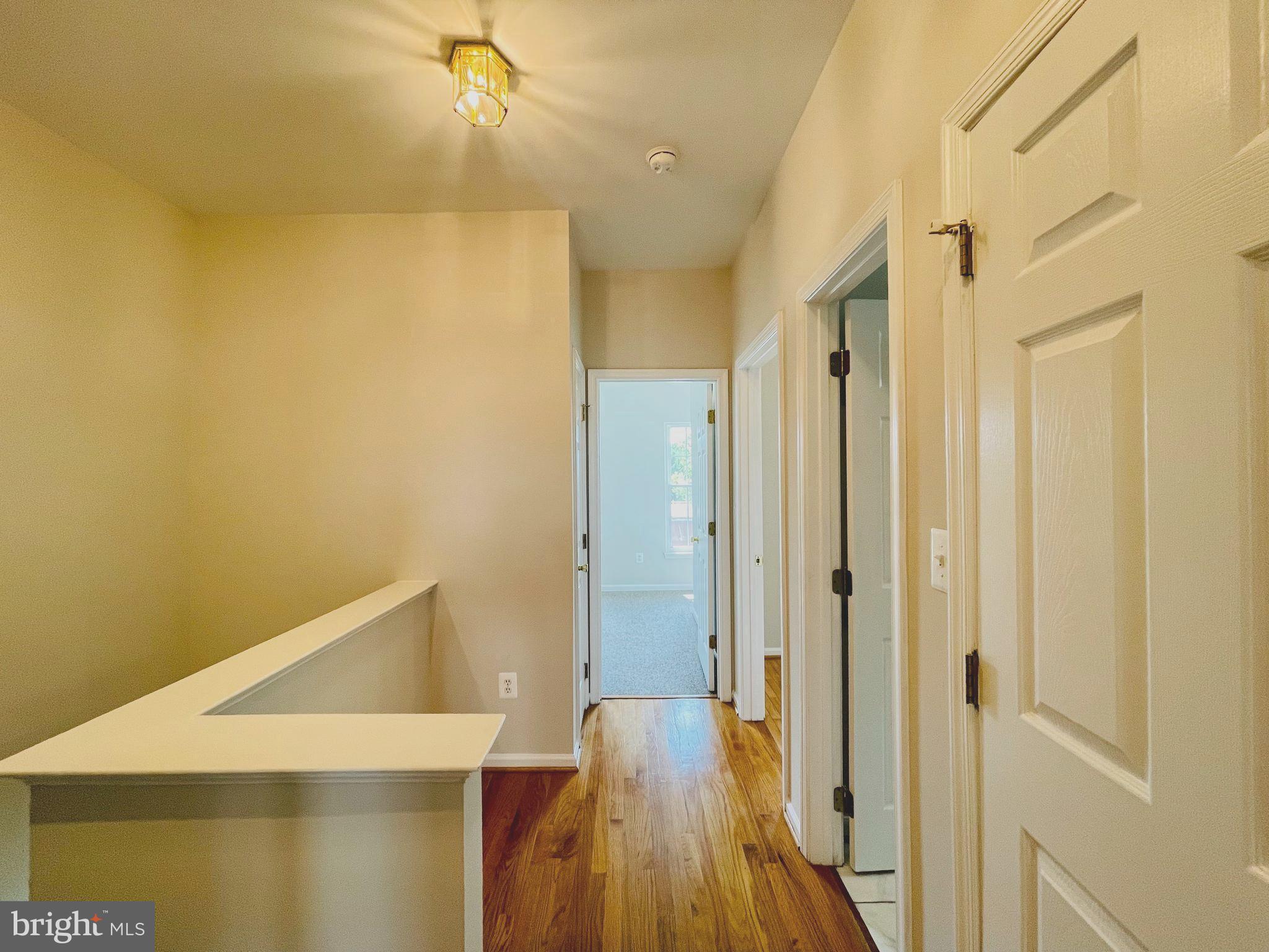 709 Gaither Road Rockville, MD 20850 - Photo 21 of 51 Hardwood upper landing w/linen closet