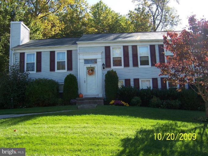 9417 Gunview Road Nottingham, MD 21236 - Photo 1 of 30 a front view of a house with a garden