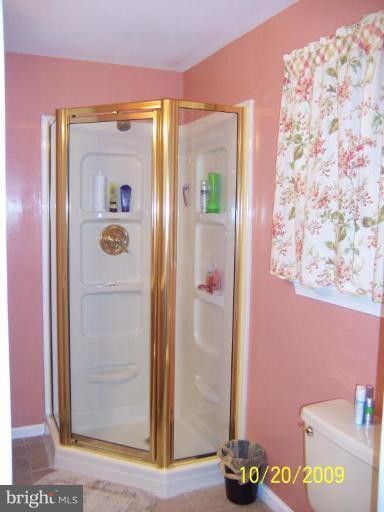 9417 Gunview Road Nottingham, MD 21236 - Photo 16 of 30 a bathroom with a shower