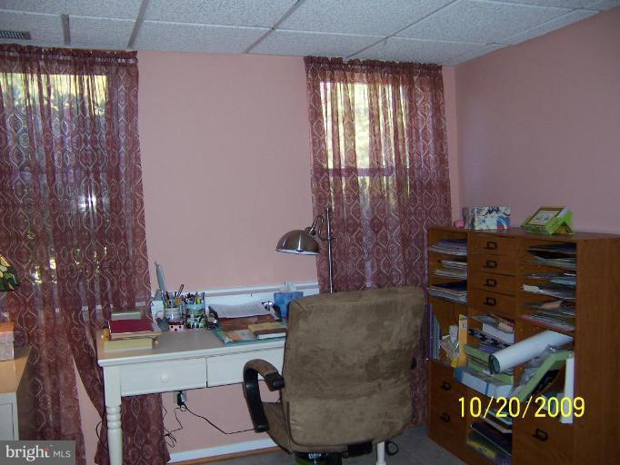 9417 Gunview Road Nottingham, MD 21236 - Photo 25 of 30 a living room with furniture and a window