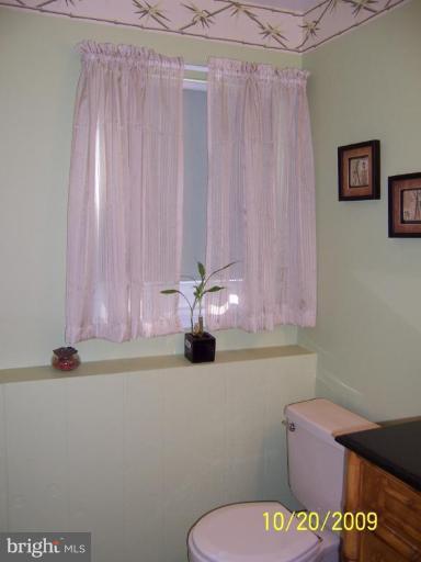 9417 Gunview Road Nottingham, MD 21236 - Photo 28 of 30 a bathroom with a toilet