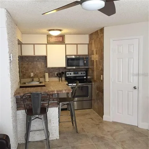 a view of a couch with an outdoor space