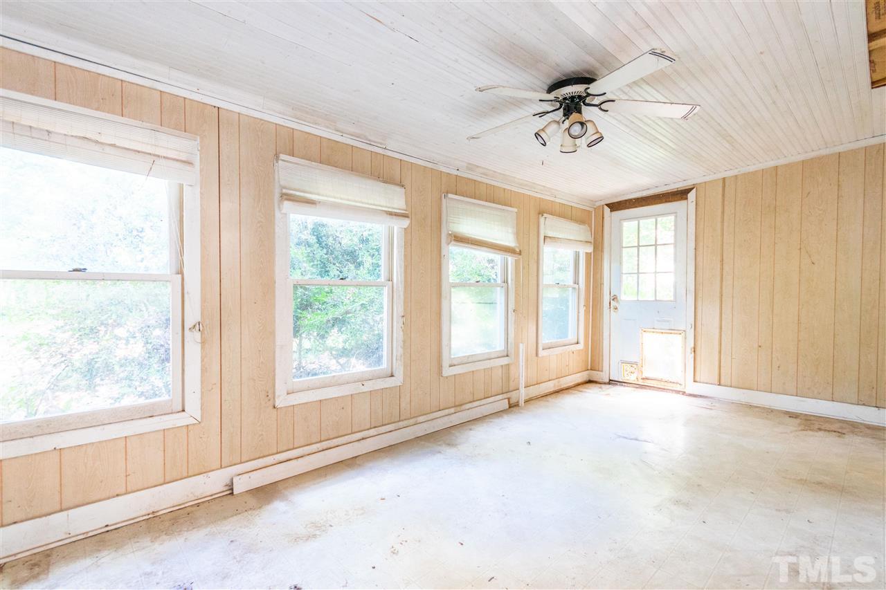 8700 Brandon Station Road Raleigh, NC 27613 - Photo 14 of 23 a view of an empty room with a window