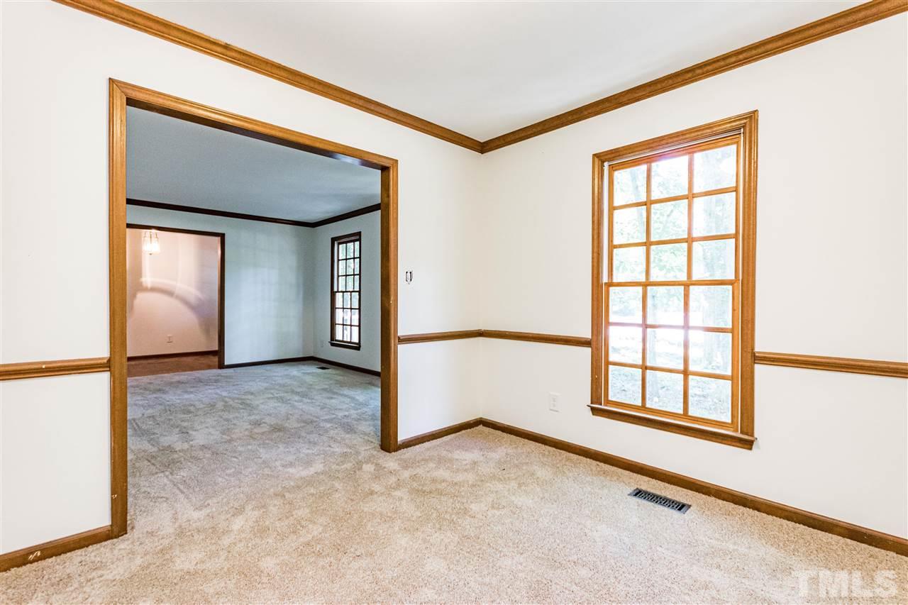 8700 Brandon Station Road Raleigh, NC 27613 - Photo 4 of 23 an empty room with a window