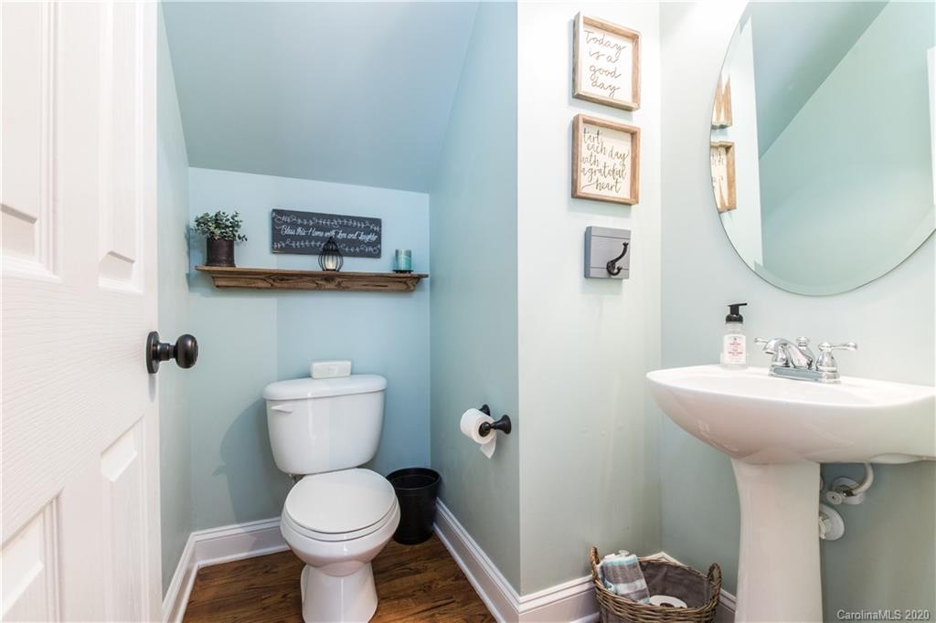 3482 Richard's Crossing Fort Mill, SC 29708 - Photo 14 of 24 a bathroom with a toilet sink and mirror