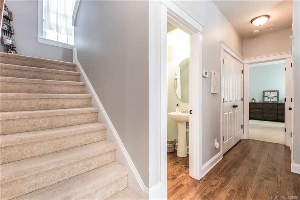 3482 Richard's Crossing Fort Mill, SC 29708 - Photo 15 of 24 a view of a hallway with wooden floor and staircase in a room