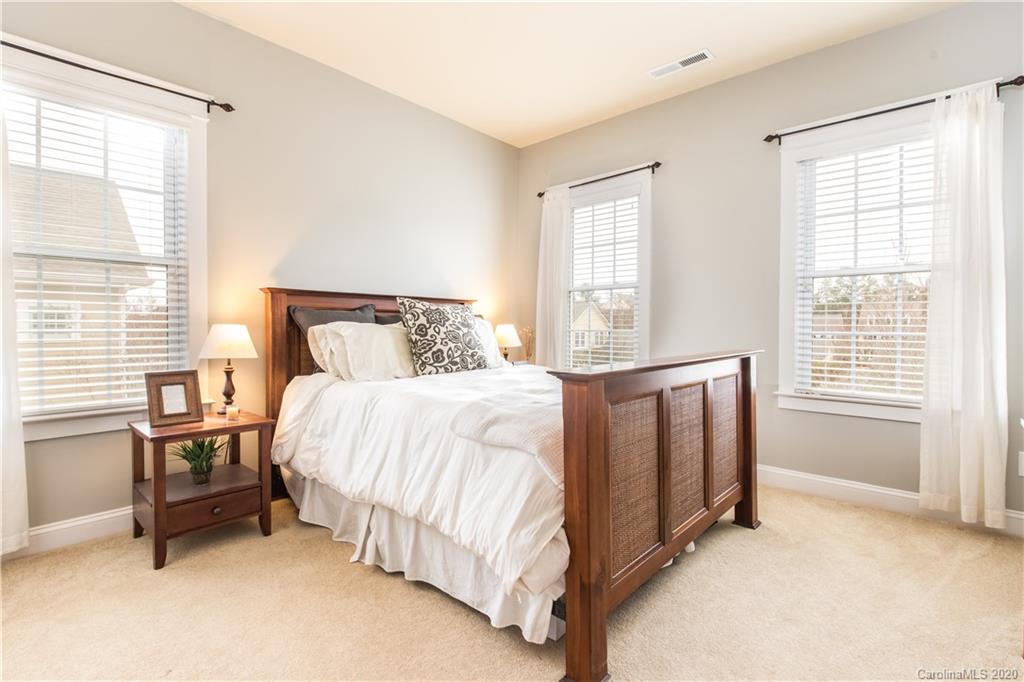 3482 Richard's Crossing Fort Mill, SC 29708 - Photo 20 of 24 a bedroom with a bed chair and next to a window