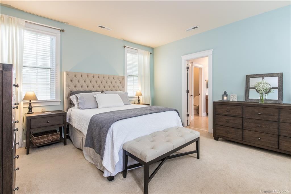 3482 Richard's Crossing Fort Mill, SC 29708 - Photo 7 of 24 a bedroom with a bed and a dresser