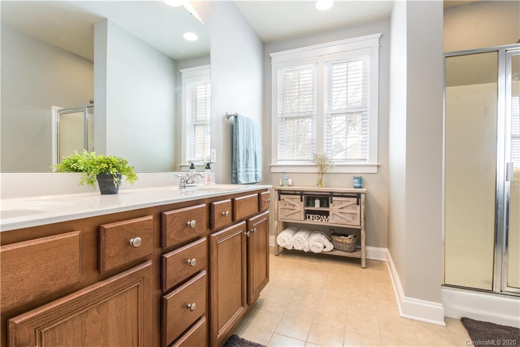 3482 Richard's Crossing Fort Mill, SC 29708 - Photo 9 of 24 a spacious bathroom with a double vanity sink and a mirror