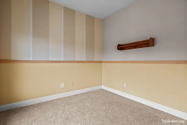a room with furniture and flat screen tv