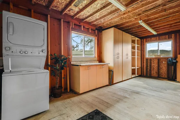a bedroom with two beds and a couch