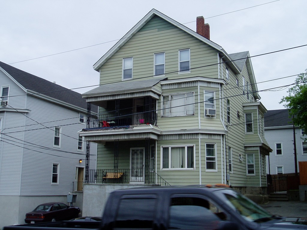 318 Broadway Fall River, MA 02721 - Photo 1 of 1 a front view of residential houses