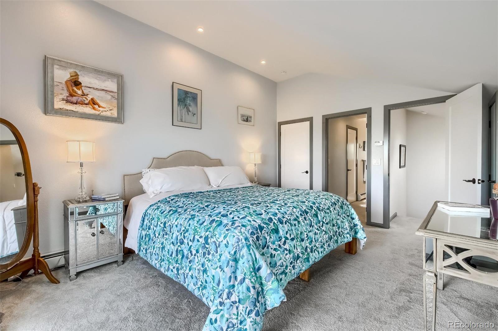 1320 Chambers Drive Boulder, CO 80305 - Photo 17 of 39 a bedroom with a bed and a cabinets