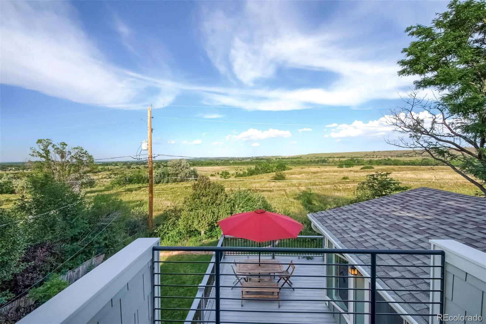 1320 Chambers Drive Boulder, CO 80305 - Photo 19 of 39 a view of a balcony with an ocean