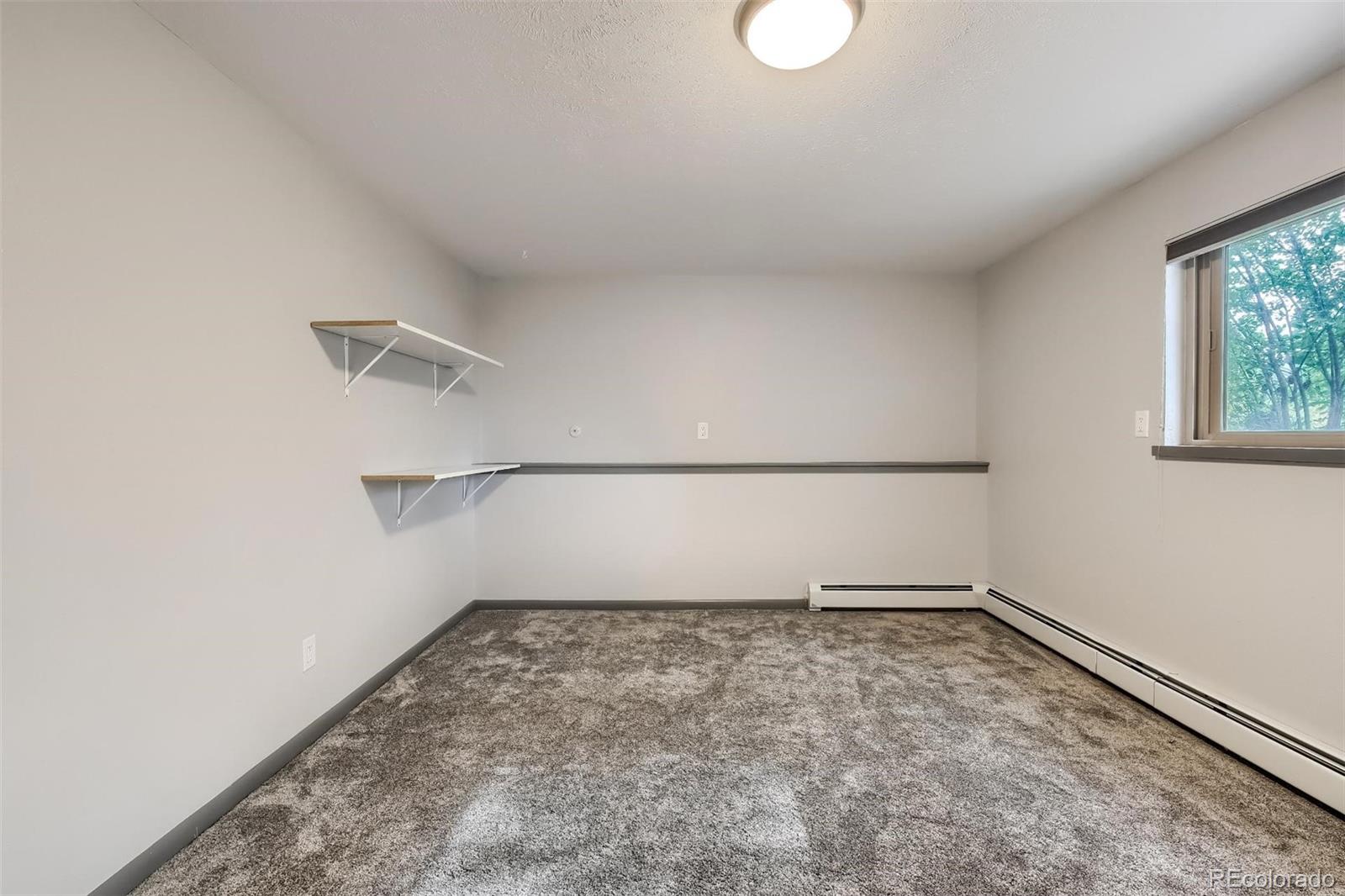 1320 Chambers Drive Boulder, CO 80305 - Photo 32 of 39 a view of a room with an empty space and window