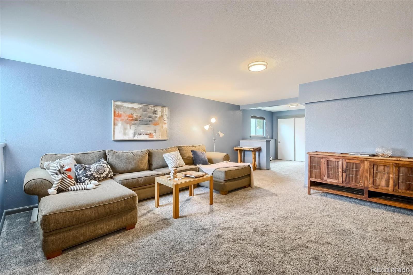 1320 Chambers Drive Boulder, CO 80305 - Photo 33 of 39 a living room with furniture flowerpot and window